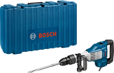 Palu penghancur Bosch GSH 11 VC beserta kotak pembawa.